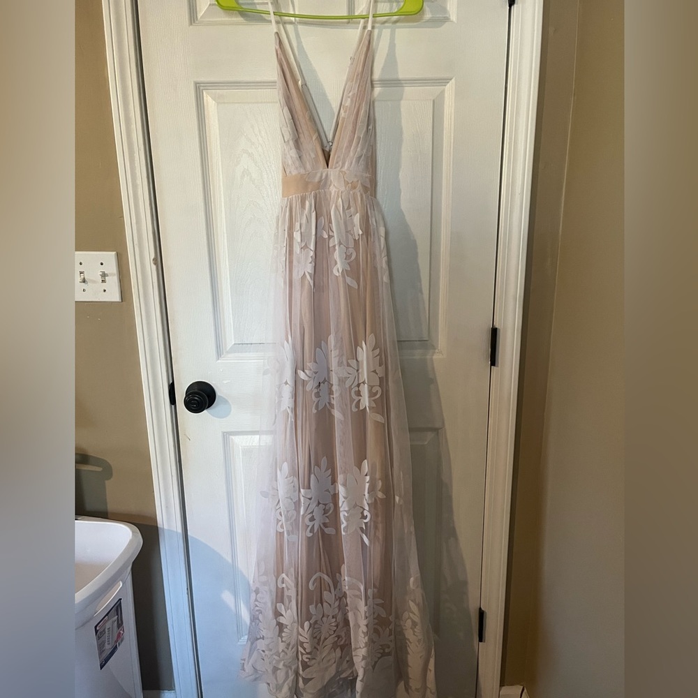 Lace dress perfect for a wedding shower, rehearsal dinner or even wedding dress